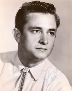 Johnny Cash, by Sun Records [Public domain]